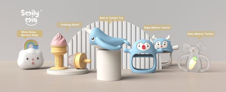 Smily Mia full baby product range including narwhal bath teether, ice cream cooling teether, reindeer and penguin teething mittens, and white noise machine