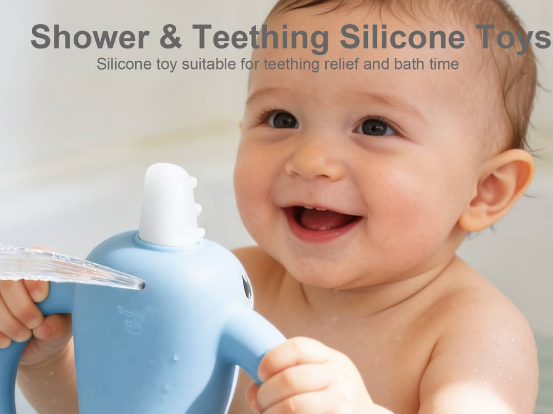 Smiling baby holding Smily Mia blue narwhal silicone teething toy during bath time, showing teething relief in action