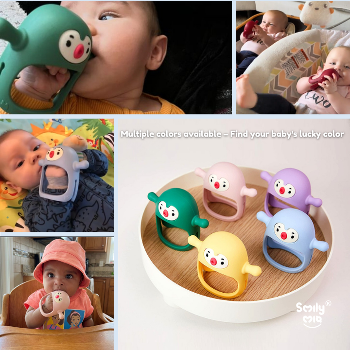 Real babies using the Smily Mia Penguin Buddy Teething Mitten in green, pink, purple, yellow and blue, with text showing multiple colours available
