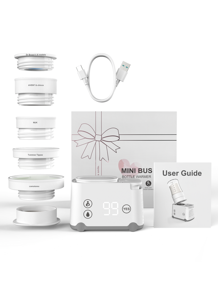 White electronic device with attachments and a user guide on a white background